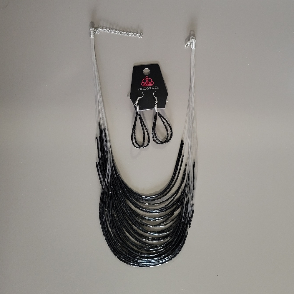 Set of fish line necklace with earrings, black beads